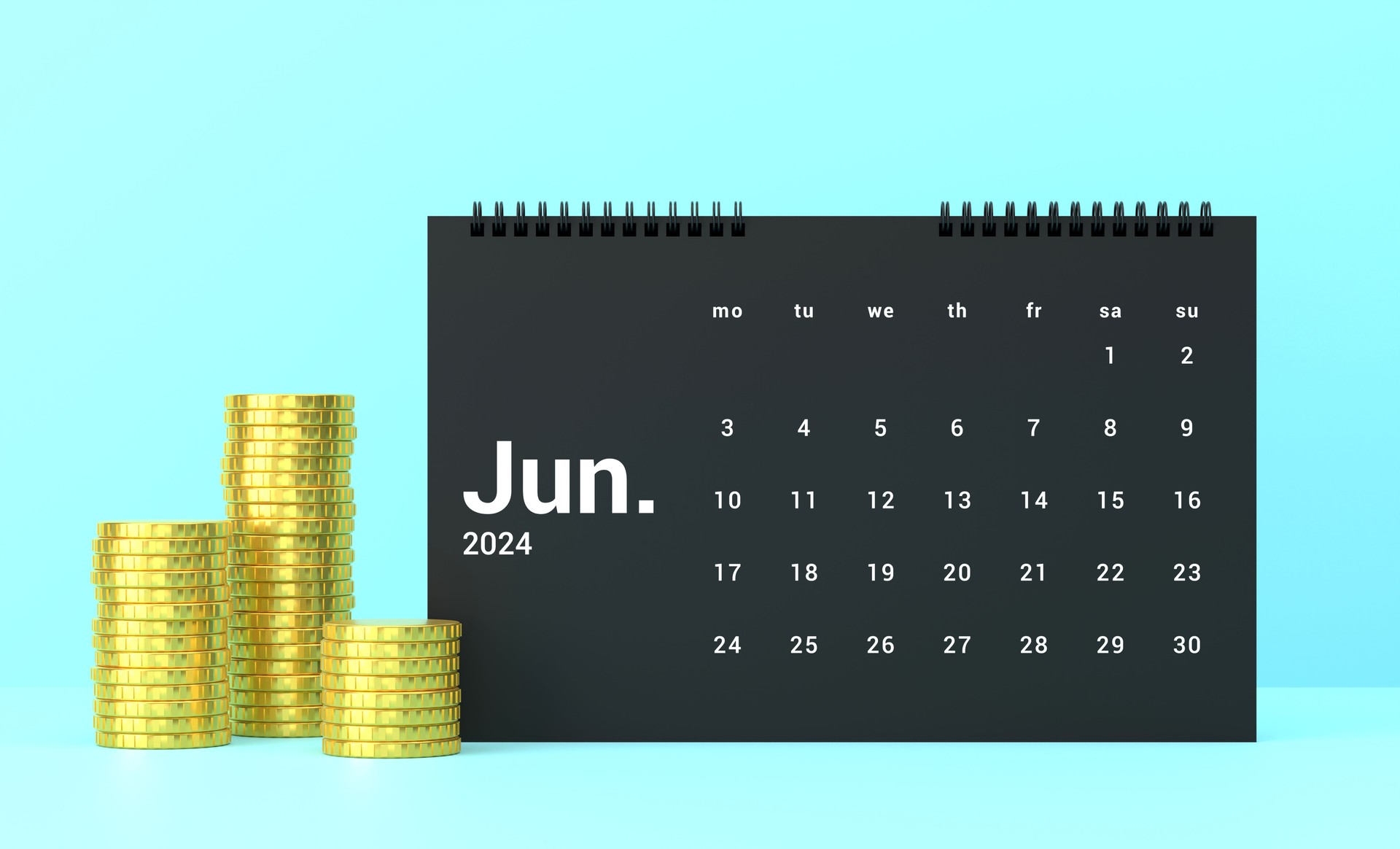 Gold Coins And 2024 June Calendar On Blue Background